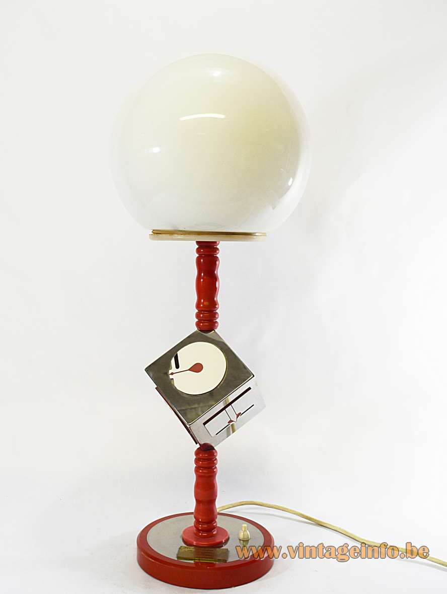 Diamond cutting early retirement table lamp with a chrome dice cube and opal globe 1970s 1982