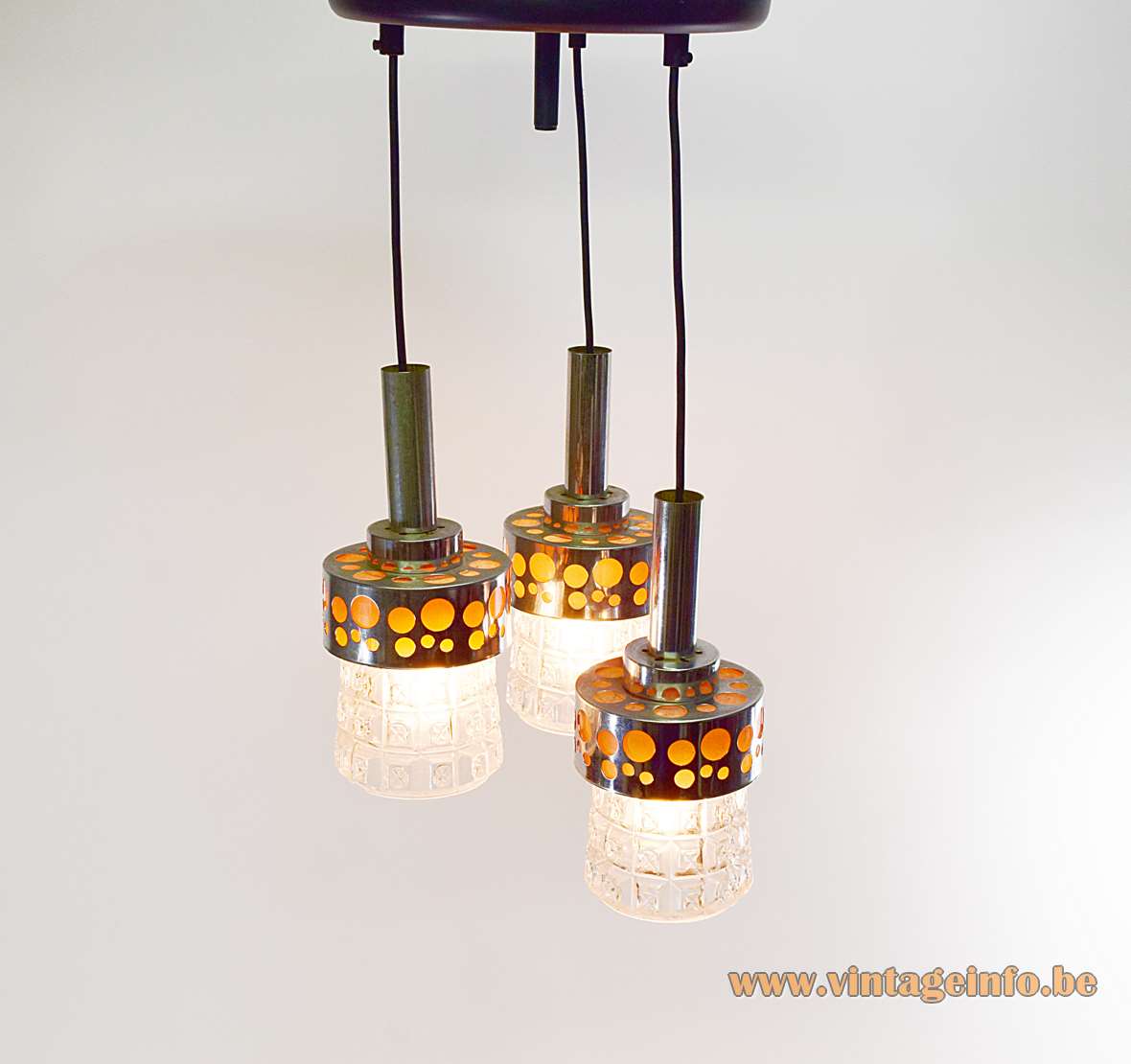 Massive Belgium triple pendant lamp chrome & orange circles pressed glass lampshades 1960s 1970s Raak The Netherlands