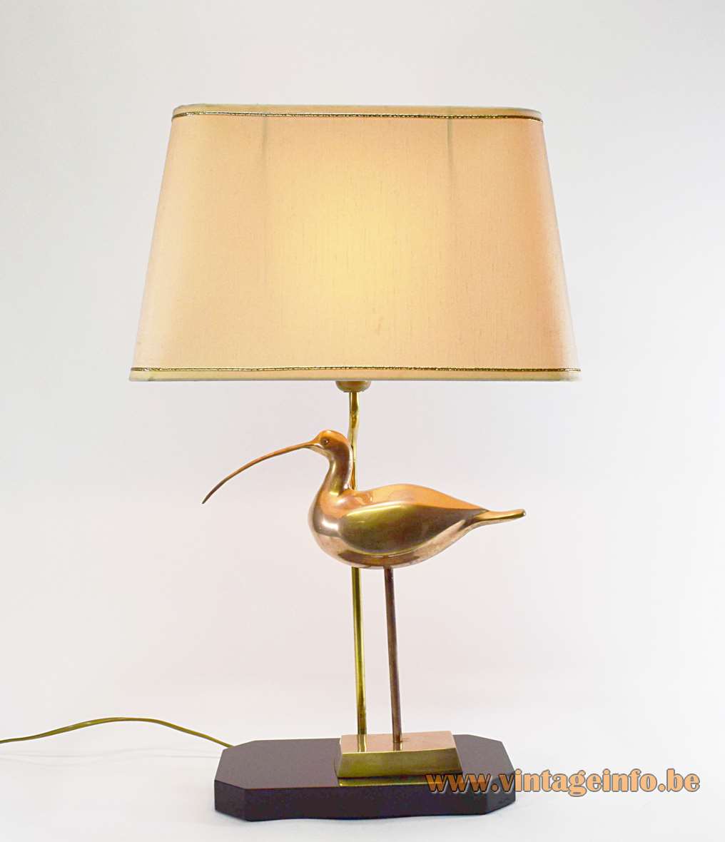 1970s brass ibis table lamps with a black wood base and brass bird by Massive Belgium