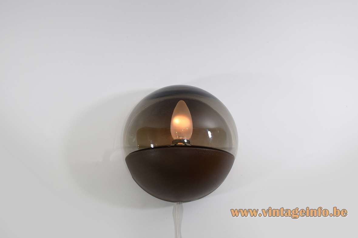 Smoked glass wall lamp half round glass globe lampshade brown plastic base HP Leuchten Germany 1970s
