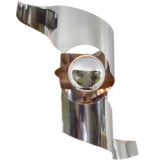 Polam stainless steel wall lamp curved twisted Inox lampshade silver tipped bulb Poland 1970s Raak Wokkel