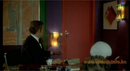 Raak Chartres blue-green glass wall lamp used as a set decoration in the 1976 film Le Corps De Mon Ennemi