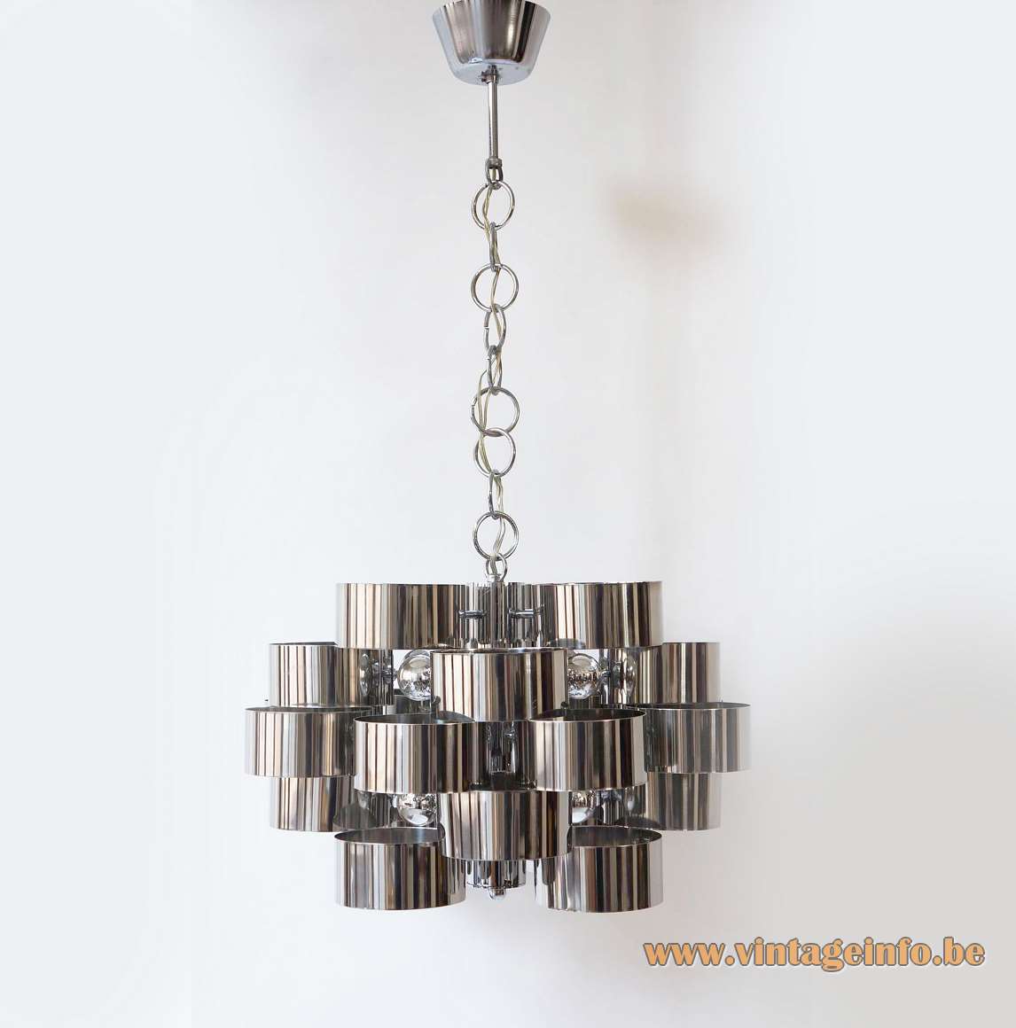 1970s stainless steel cylinders chandelier stacked metal rings round chrome chain canopy 8 E14 sockets Italy vintage