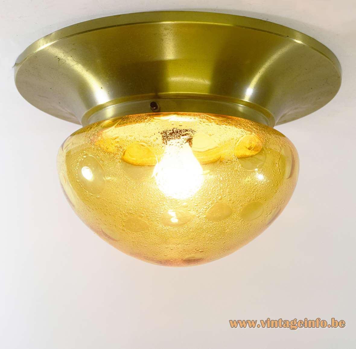 1970s amber glass flush mount ceiling lamp round gold aluminium base bubble glass lampshade Dijkstra 1960s