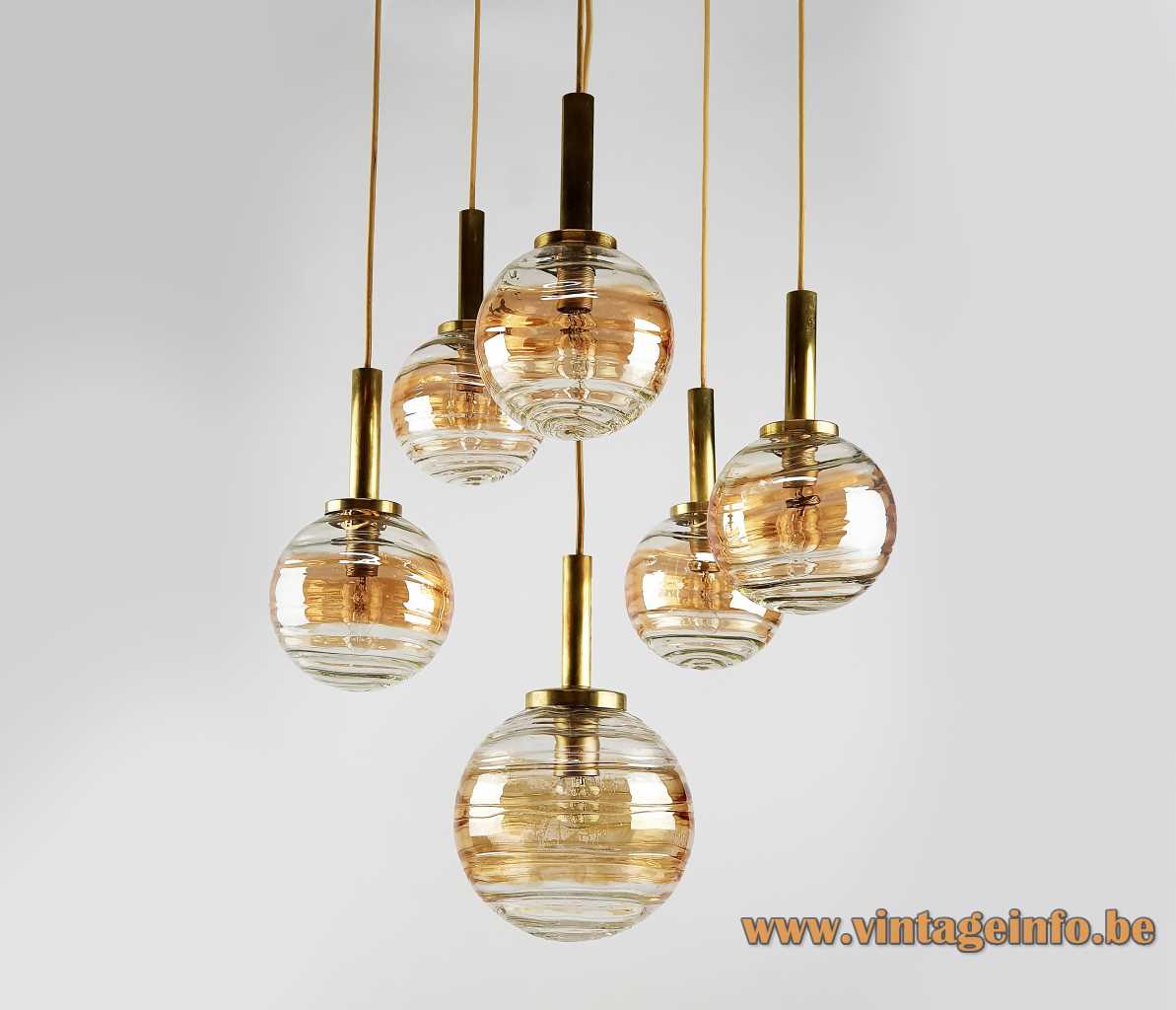 Wortmann globe pendant chandelier with six cascade hanging amber and clear glass lamps 1960s WOFI Leuchten