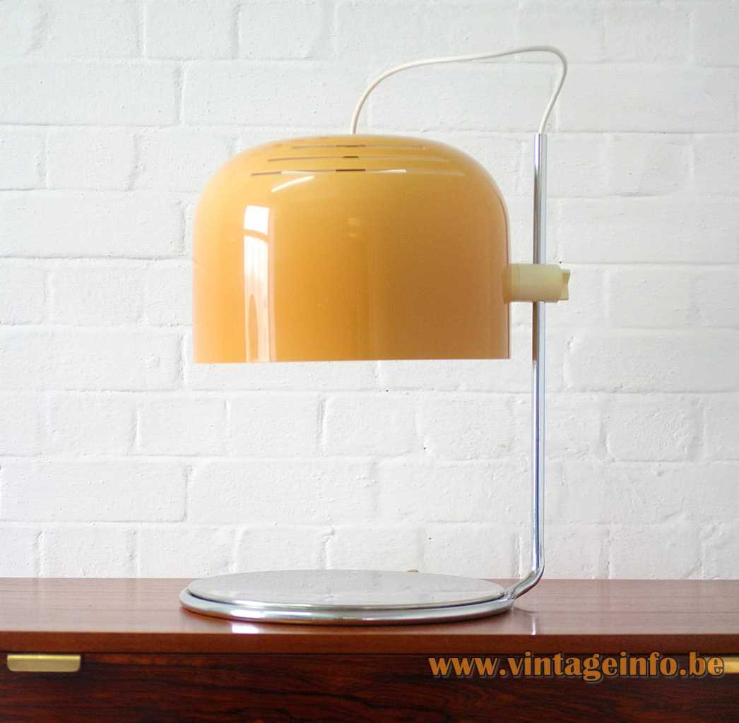 1960s Harvey Guzzini table lamp design: Luigi Massoni round chrome base yellow-brown acrylic lampshade 1970s Italy