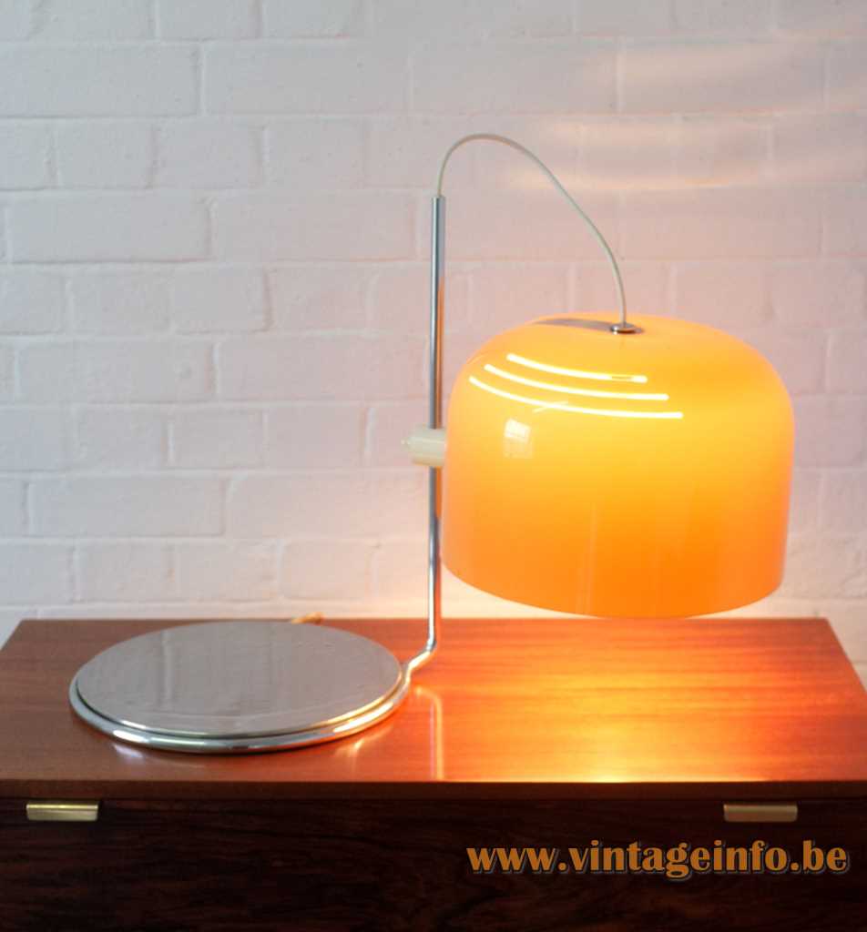 1960s Harvey Guzzini table lamp design: Luigi Massoni round chrome base yellow-brown acrylic lampshade 1970s Italy