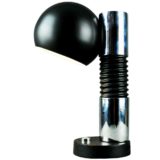 Globe desk lamp round black cast iron base built-in switch chrome tube 1970s Germany